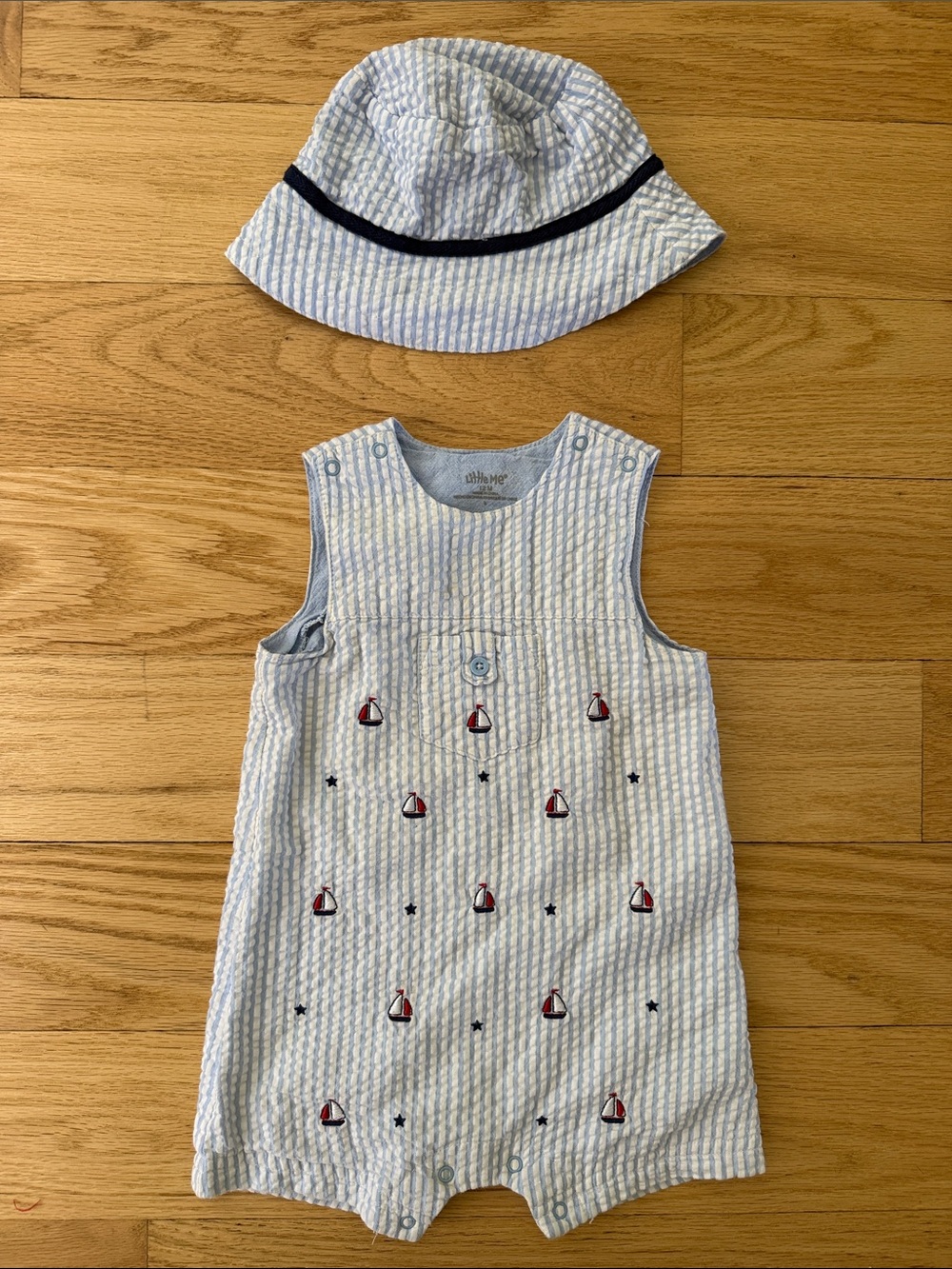 Little Me Light Blue and White Seersucker Sailboat Romper with Hat